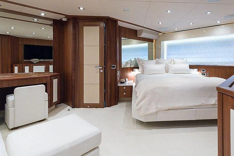 a room with a bed and a desk aboard COPPER 3 Yacht for Sale