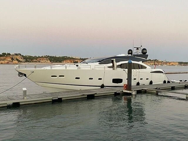 a boat docked at a pier aboard COPPER 3 Yacht for Sale