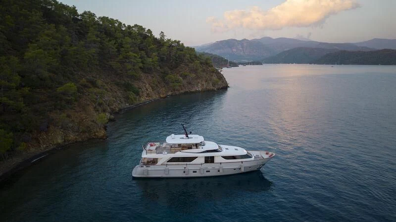 a boat on the water aboard AQUILA Q Yacht for Sale