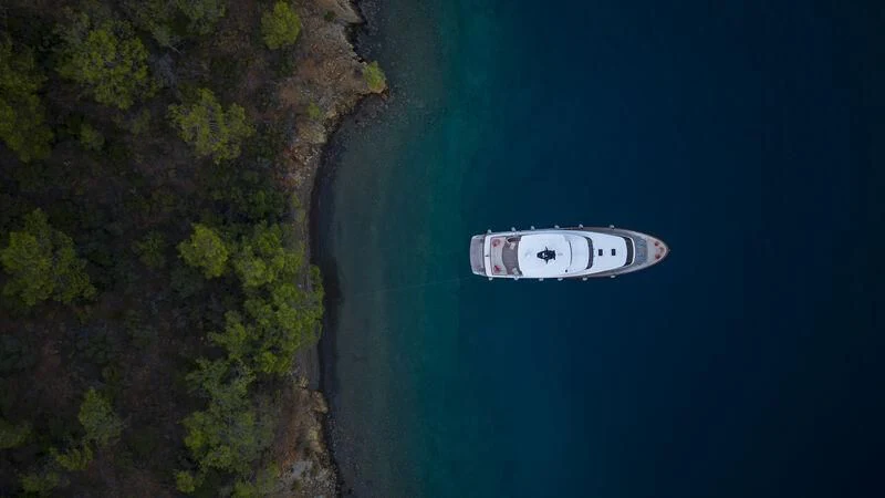 a sign on a rock aboard AQUILA Q Yacht for Sale