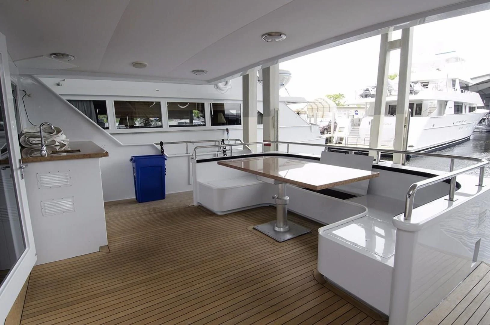 a room with a table and chairs aboard GOLDEN TOUCH Yacht for Sale