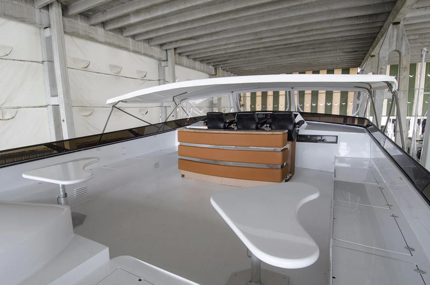a white boat with a wooden dock aboard GOLDEN TOUCH Yacht for Sale