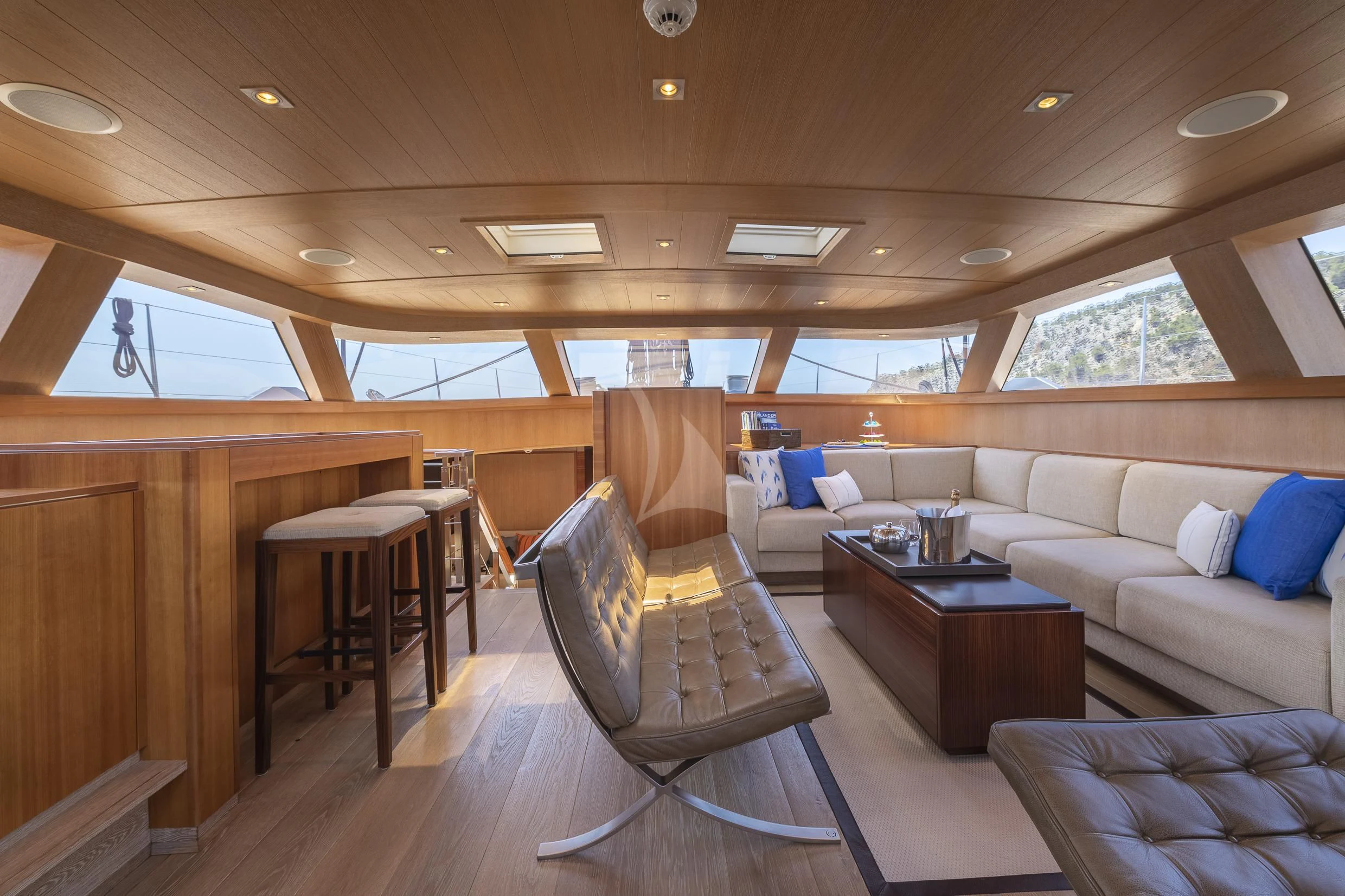 a room with a couch and a table aboard SHARLOU Yacht for Sale