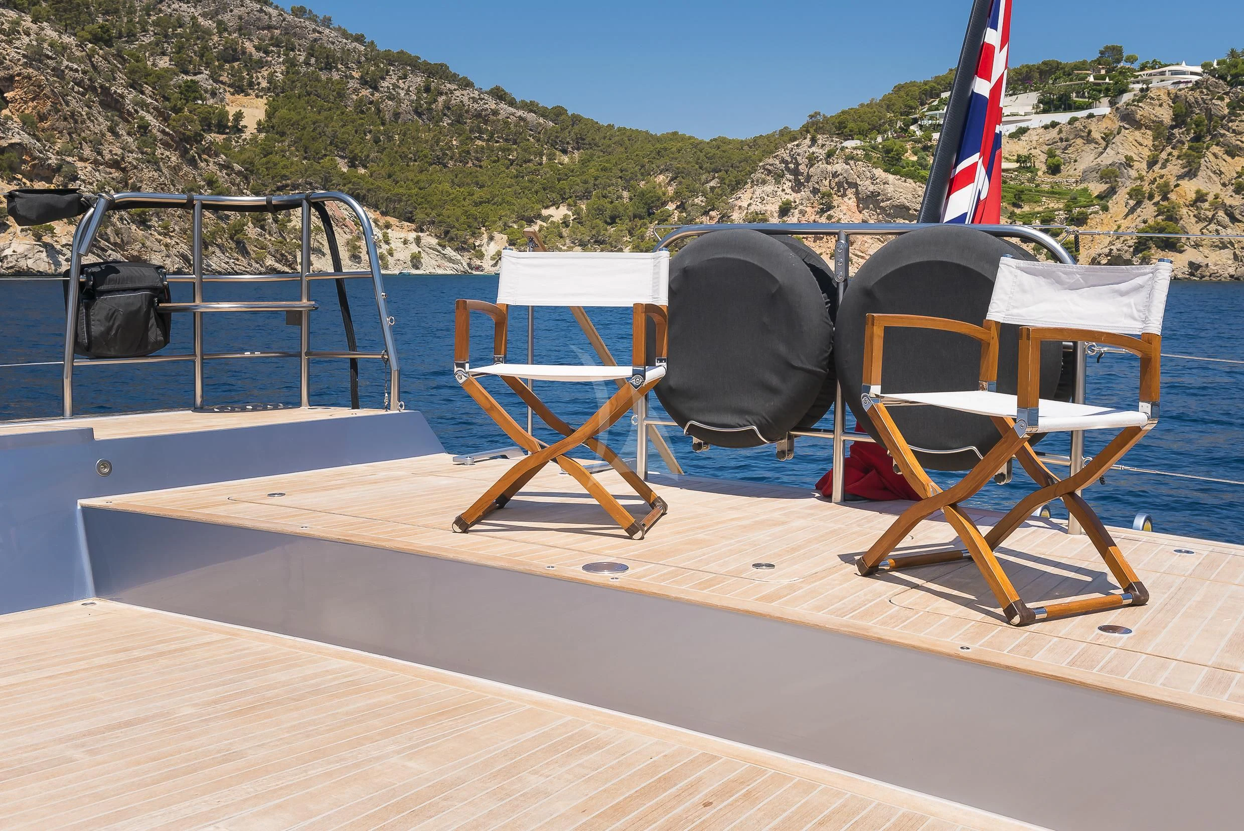 chairs on a deck aboard SHARLOU Yacht for Sale