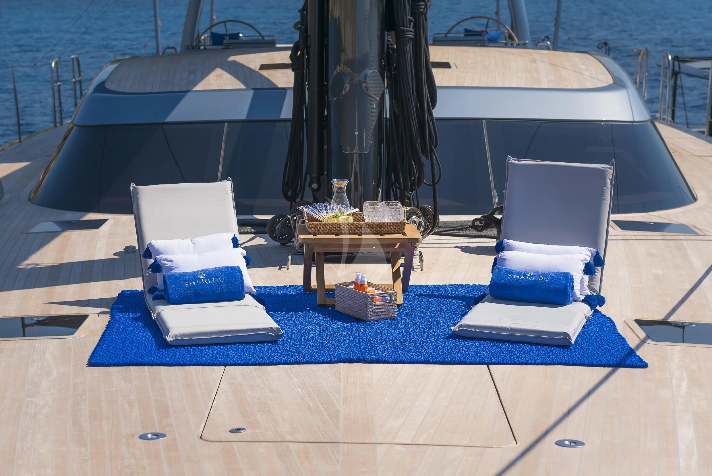 a table with chairs on it aboard SHARLOU Yacht for Sale