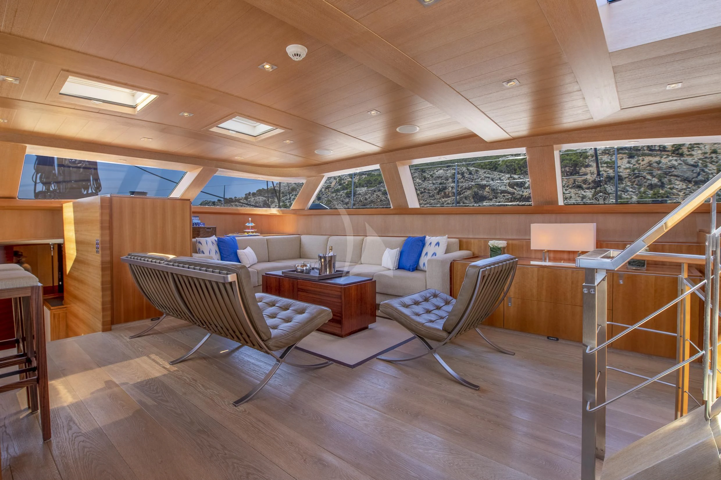 a room with a couch and a table aboard SHARLOU Yacht for Sale