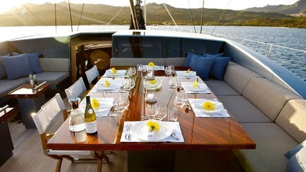 a table set for a meal aboard SHARLOU Yacht for Sale