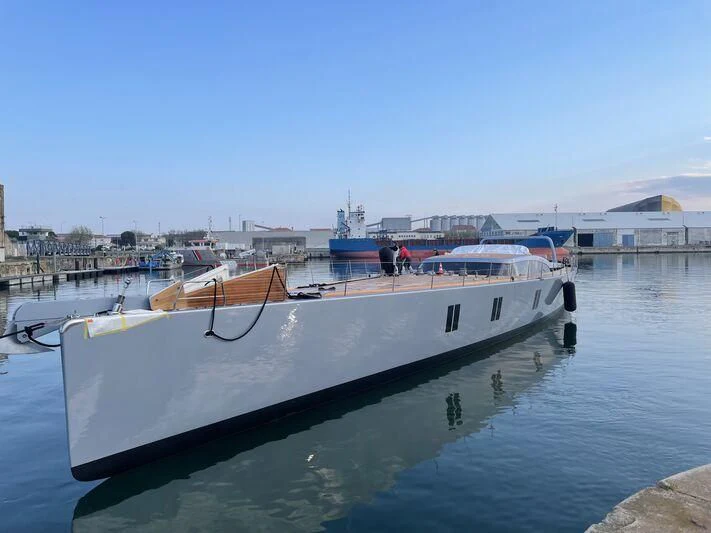 a boat docked at a pier aboard SHARLOU Yacht for Sale