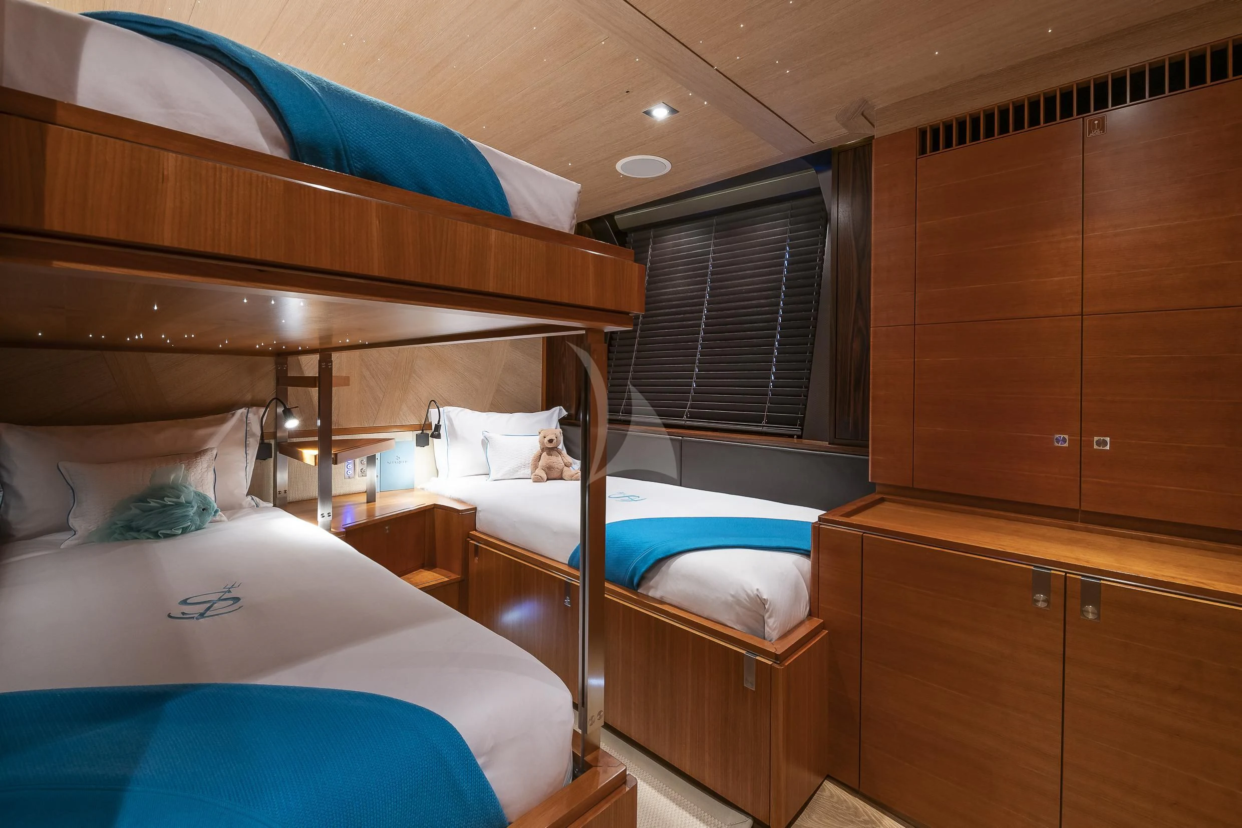 a couple of beds in a room aboard SHARLOU Yacht for Sale