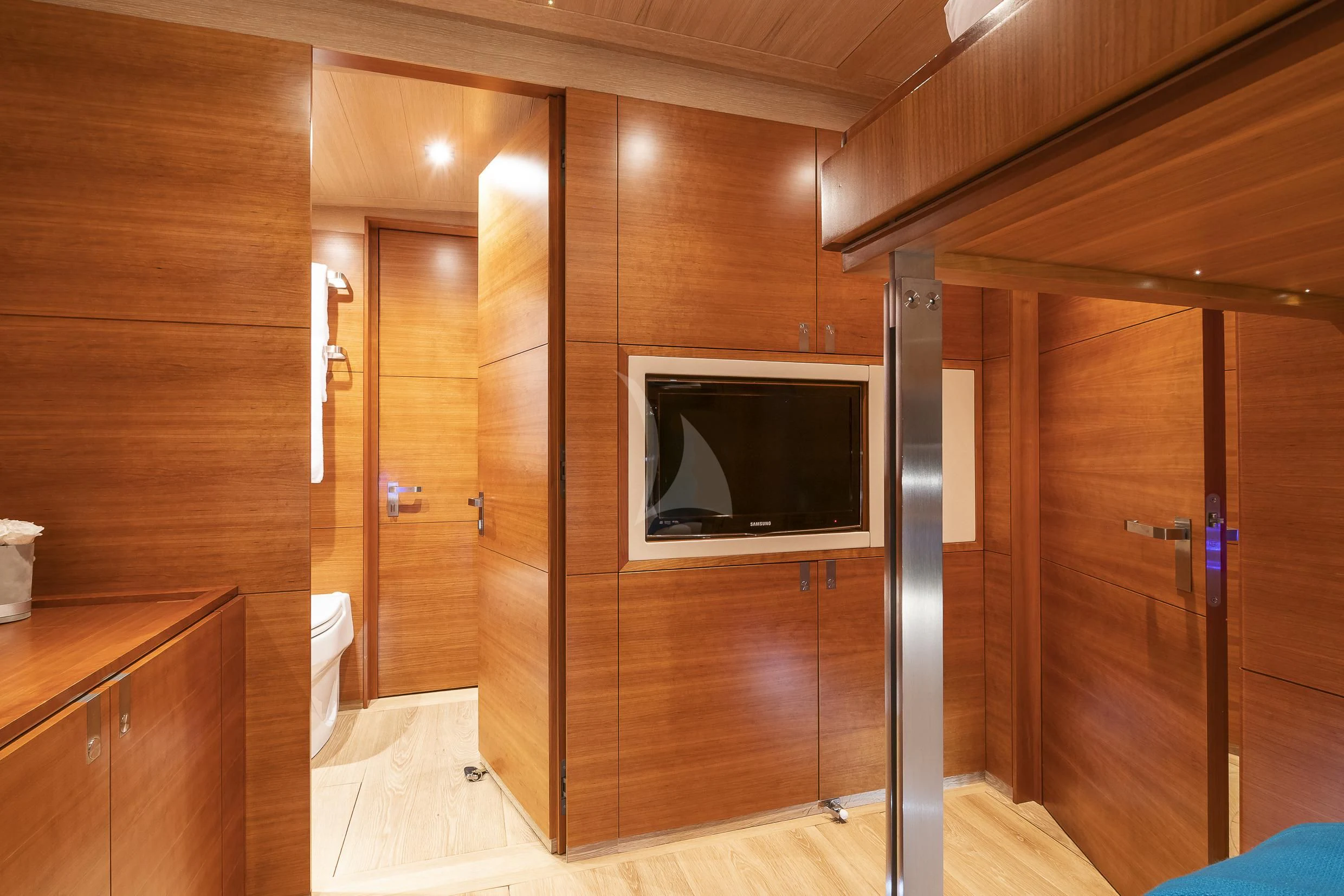 a room with wooden cabinets aboard SHARLOU Yacht for Sale
