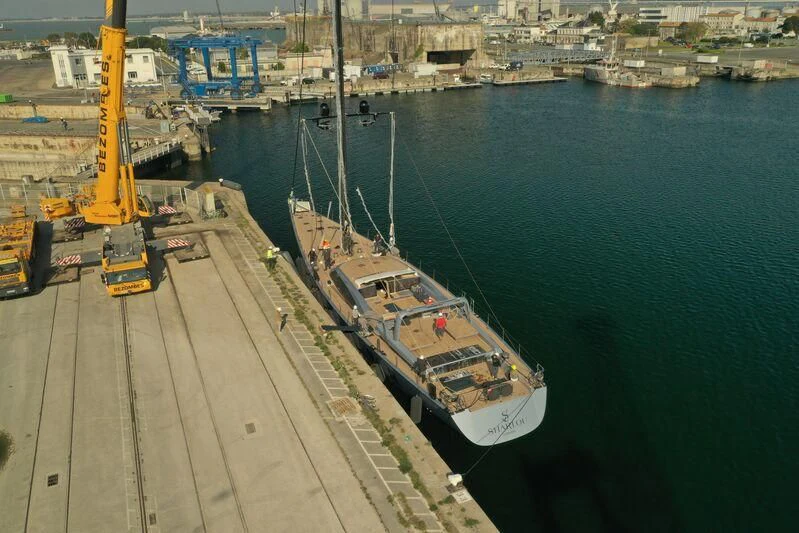 a large ship in the water aboard SHARLOU Yacht for Sale