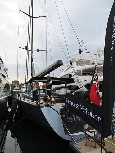 a person standing on a boat aboard SHARLOU Yacht for Sale