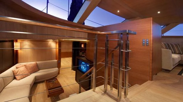 a room with a bunk bed and a couch aboard SHARLOU Yacht for Sale