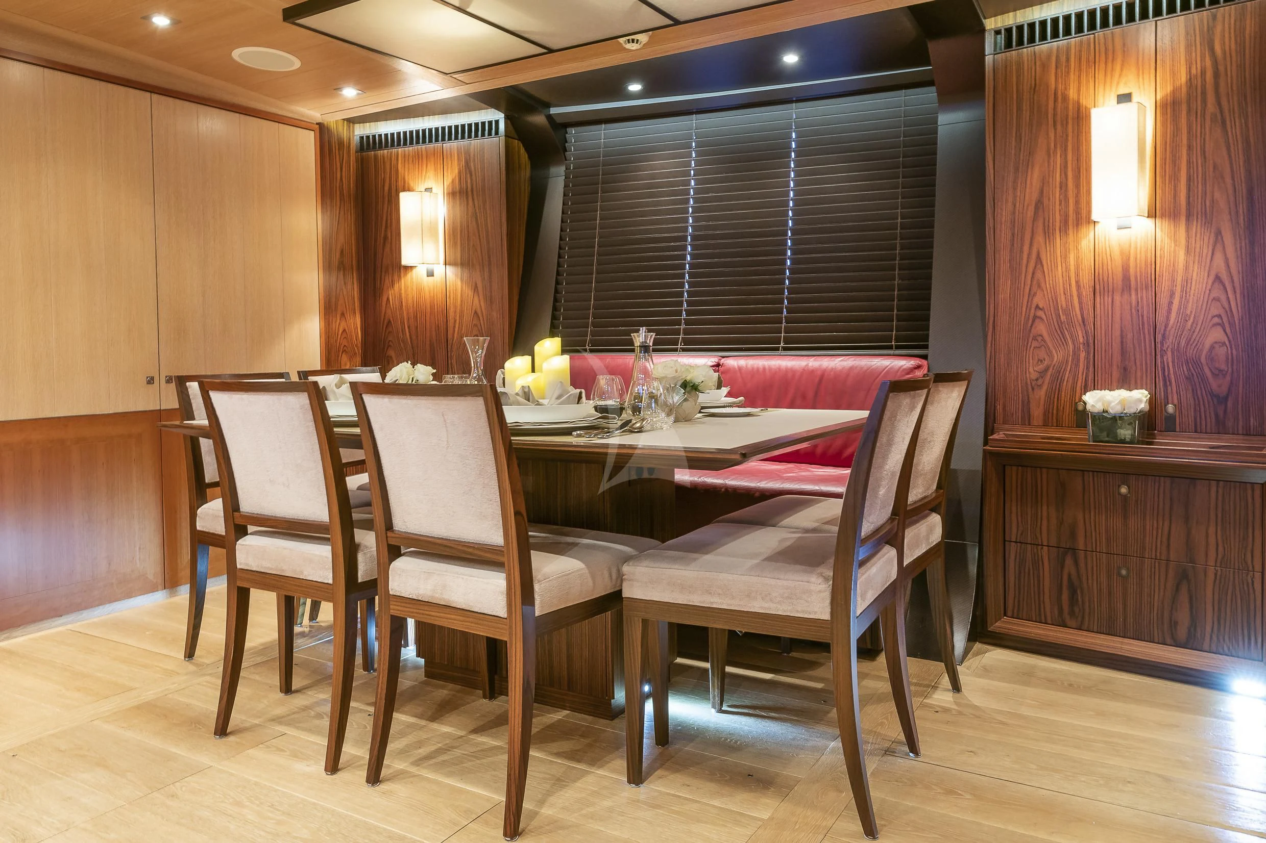 a dining table and chairs aboard SHARLOU Yacht for Sale