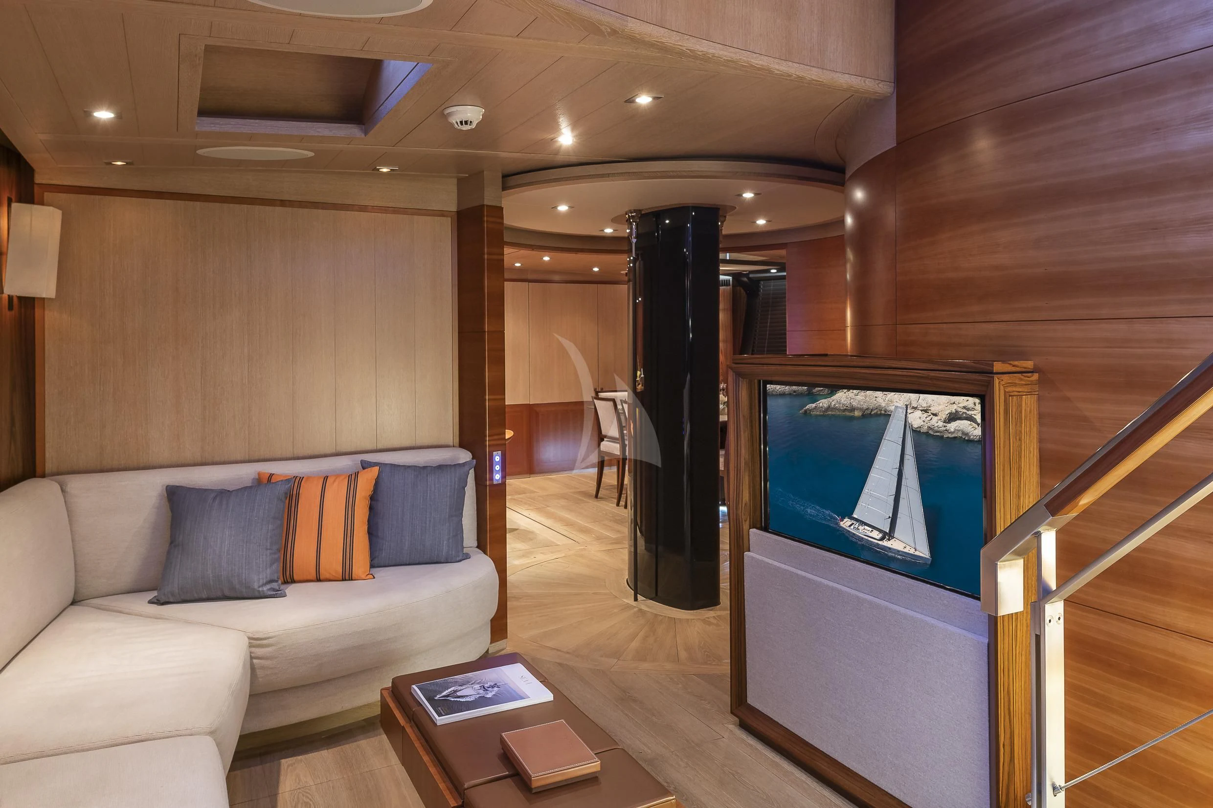 a living room with a large tv aboard SHARLOU Yacht for Sale