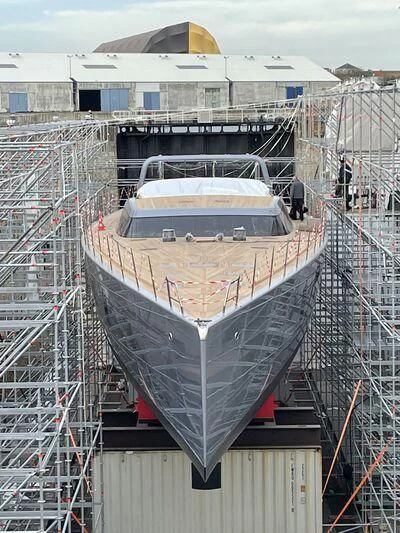 a large ship docked aboard SHARLOU Yacht for Sale