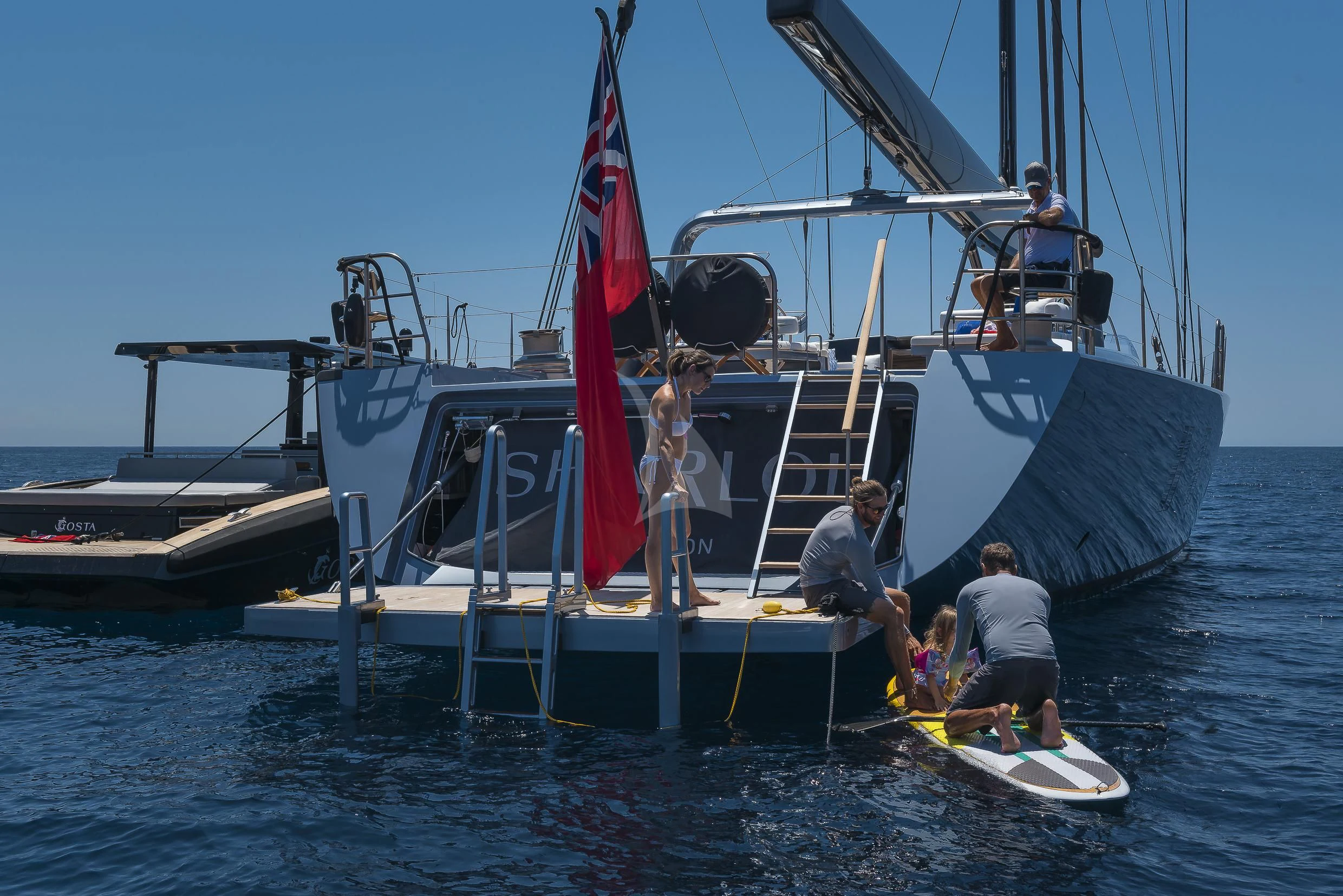 a boat with people on it aboard SHARLOU Yacht for Sale