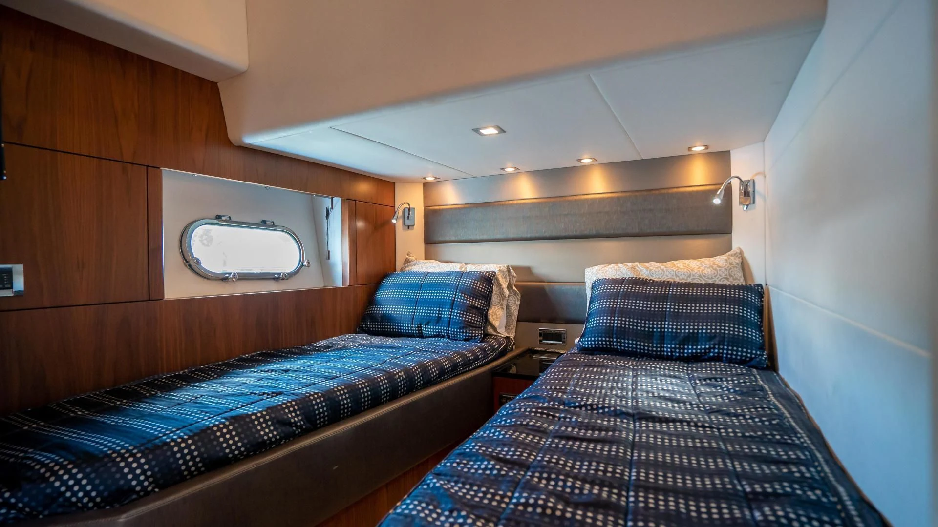 a couple of beds in a room aboard JIMBO Yacht for Sale