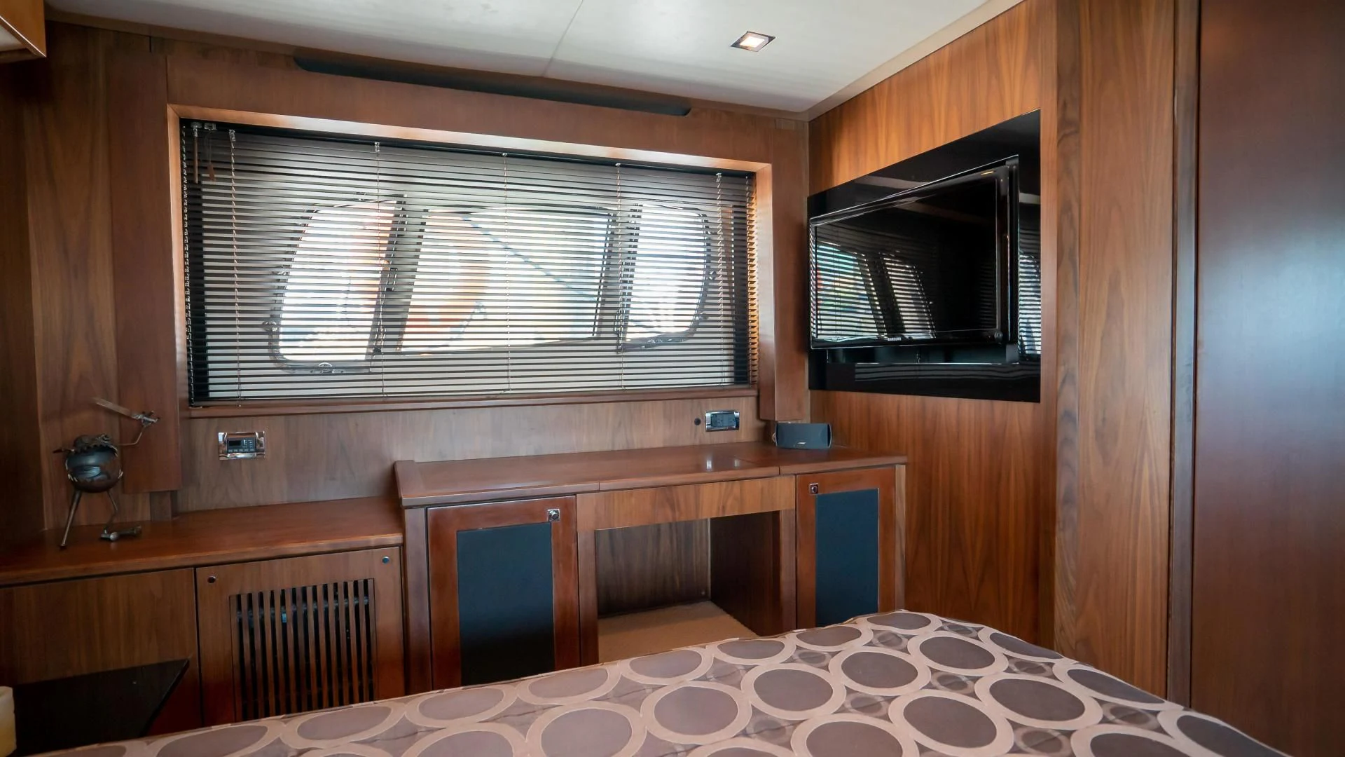 a room with a table and a window aboard JIMBO Yacht for Sale