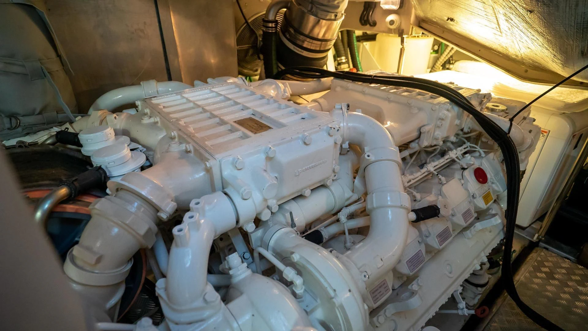 a car engine with a large piece of paper in the back aboard JIMBO Yacht for Sale