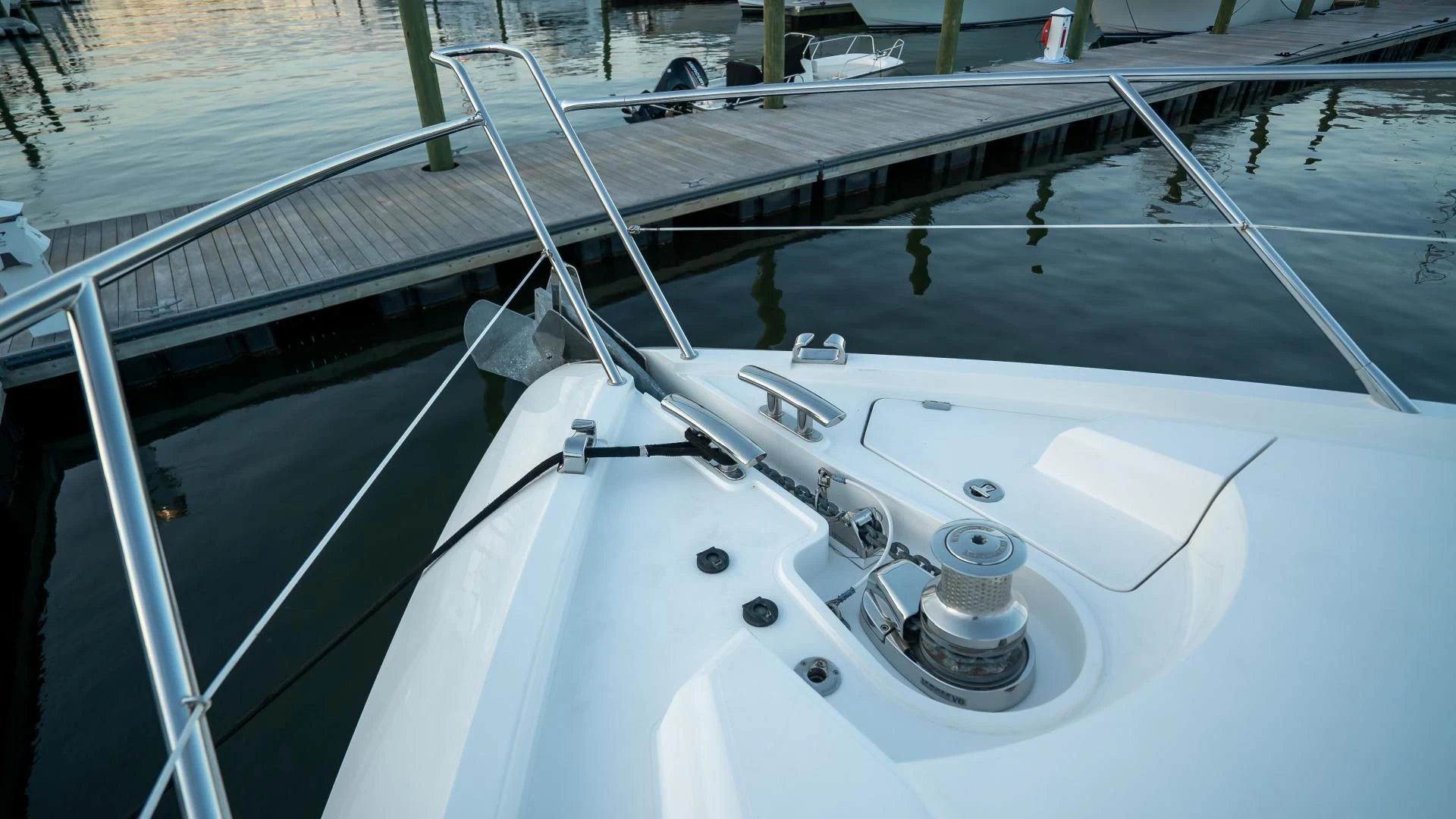 a white boat on the water aboard JIMBO Yacht for Sale