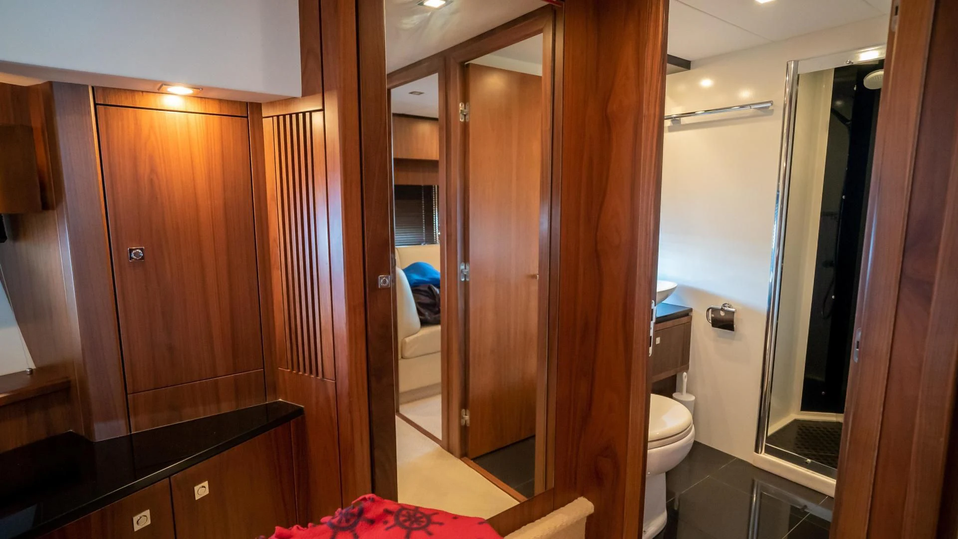a bathroom with a glass shower aboard JIMBO Yacht for Sale
