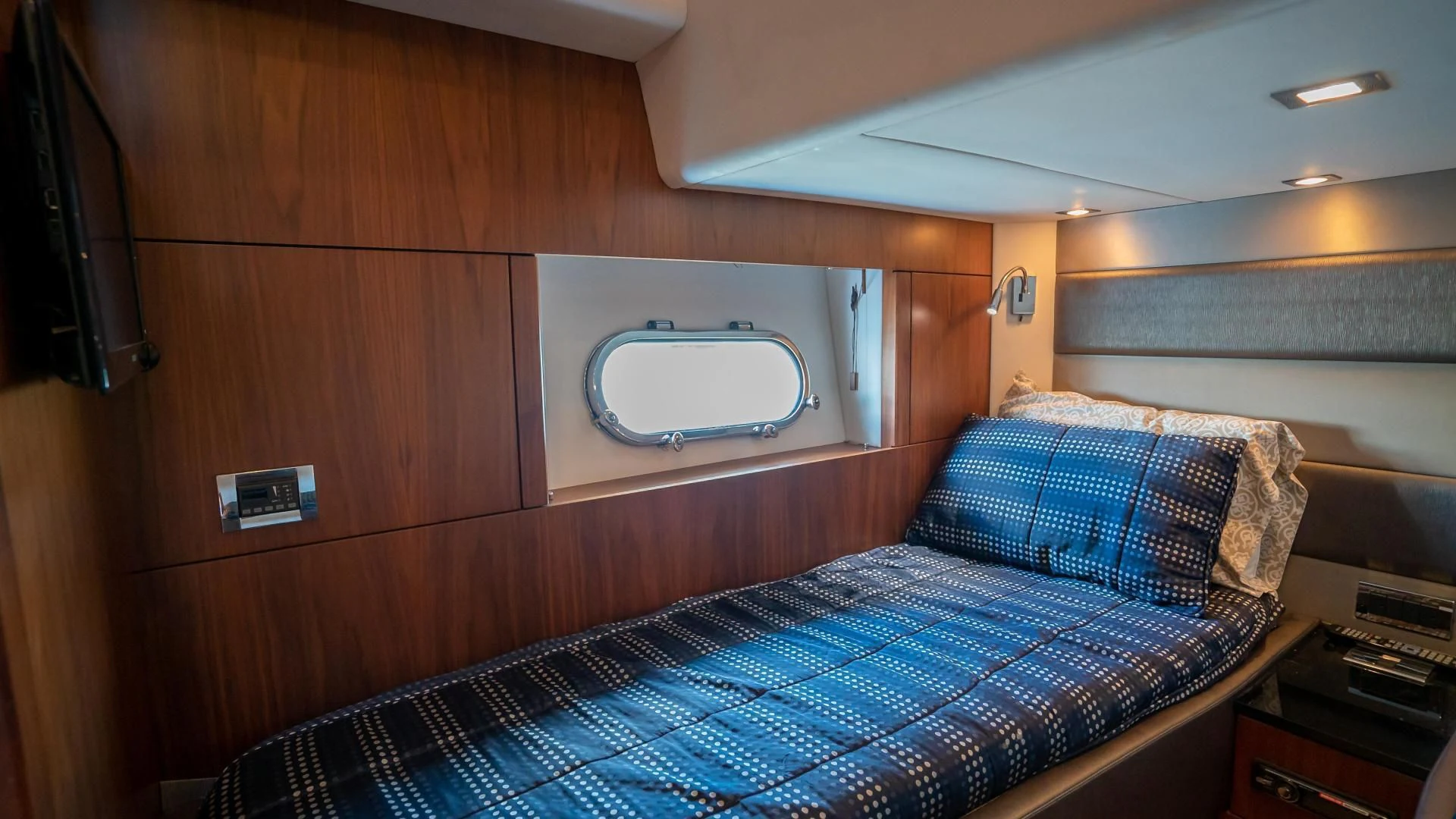 a bed in a room aboard JIMBO Yacht for Sale