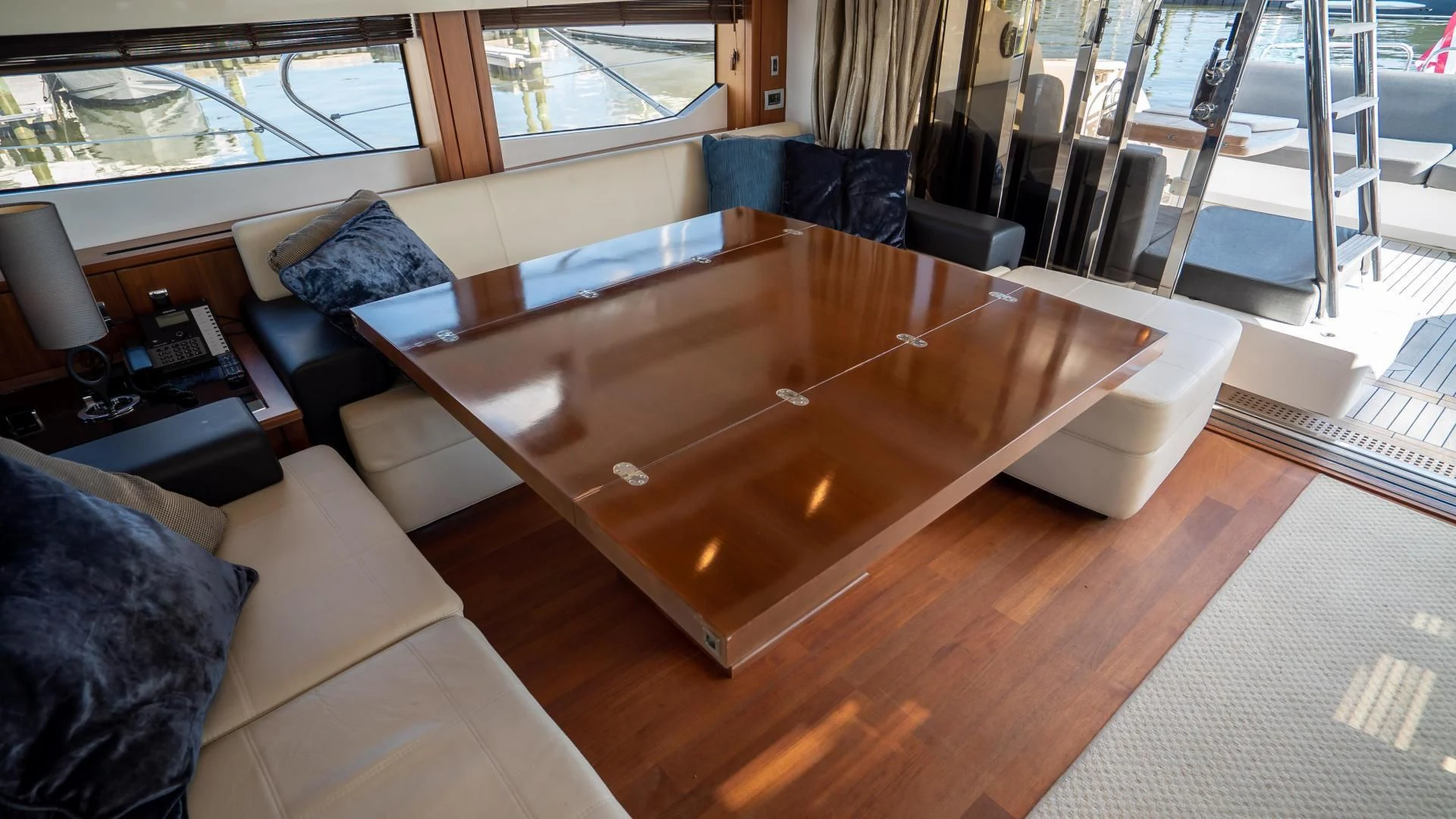 a large pool table in a living room aboard JIMBO Yacht for Sale