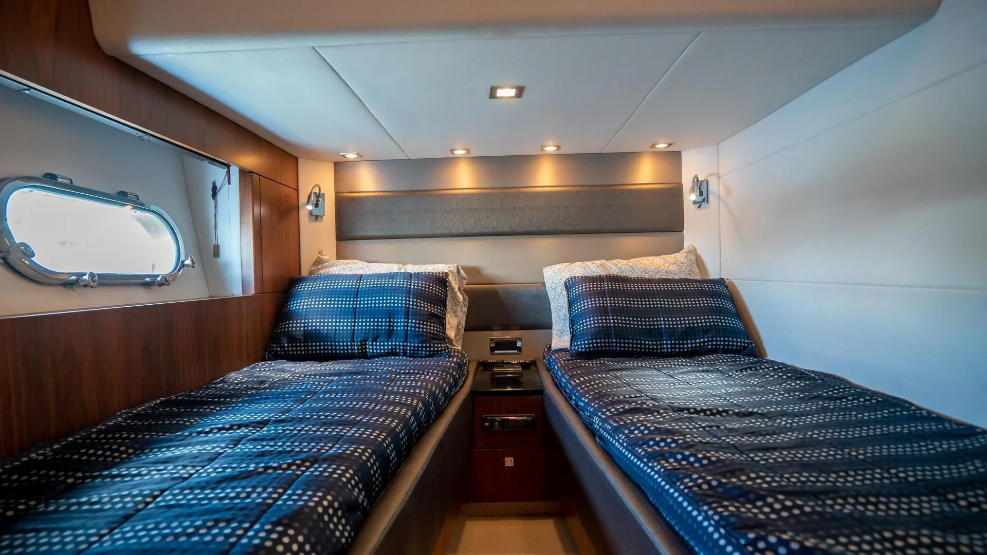 a couple of beds in a room aboard JIMBO Yacht for Sale