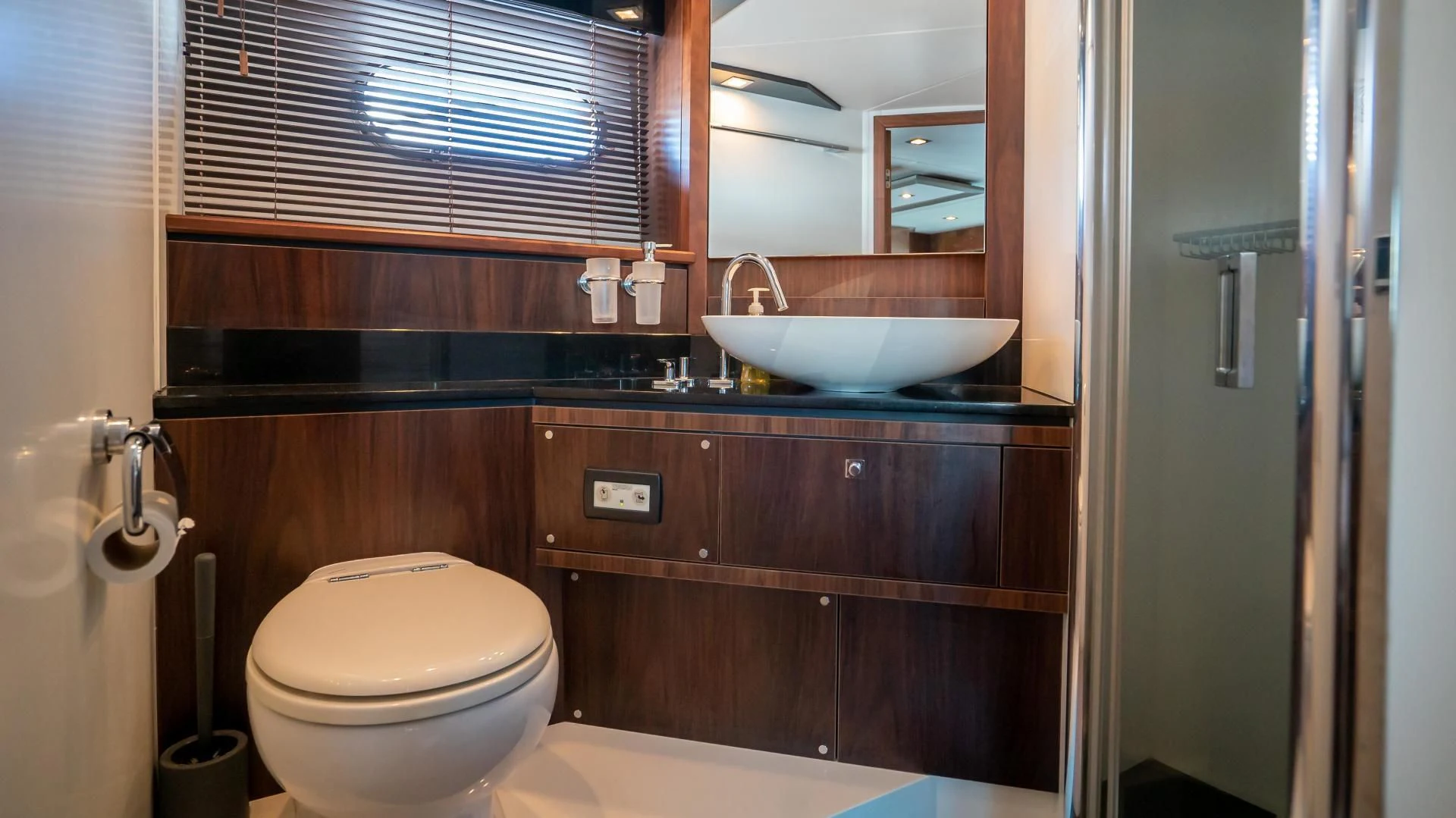 a bathroom with a sink and toilet aboard JIMBO Yacht for Sale