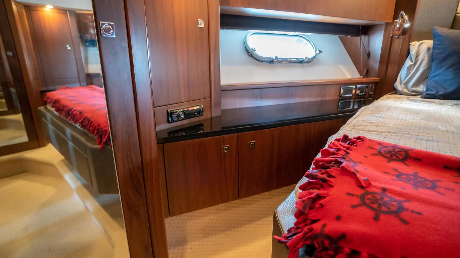 a bed in a room aboard JIMBO Yacht for Sale