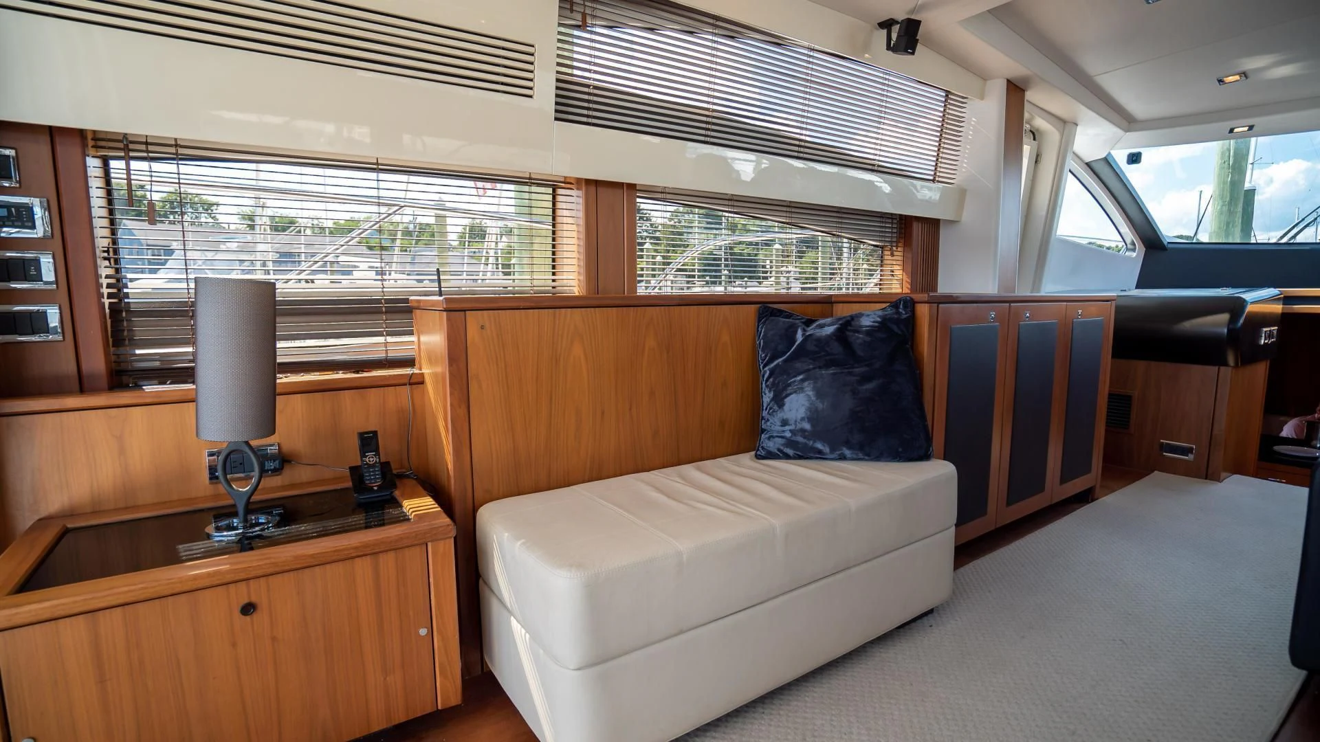 a room with a couch and a table aboard JIMBO Yacht for Sale