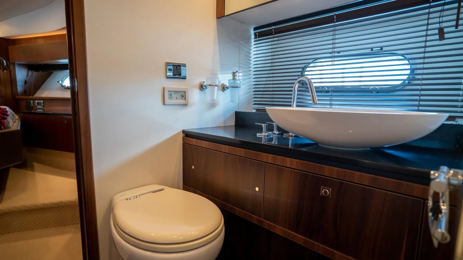a bathroom with a sink and a toilet aboard JIMBO Yacht for Sale