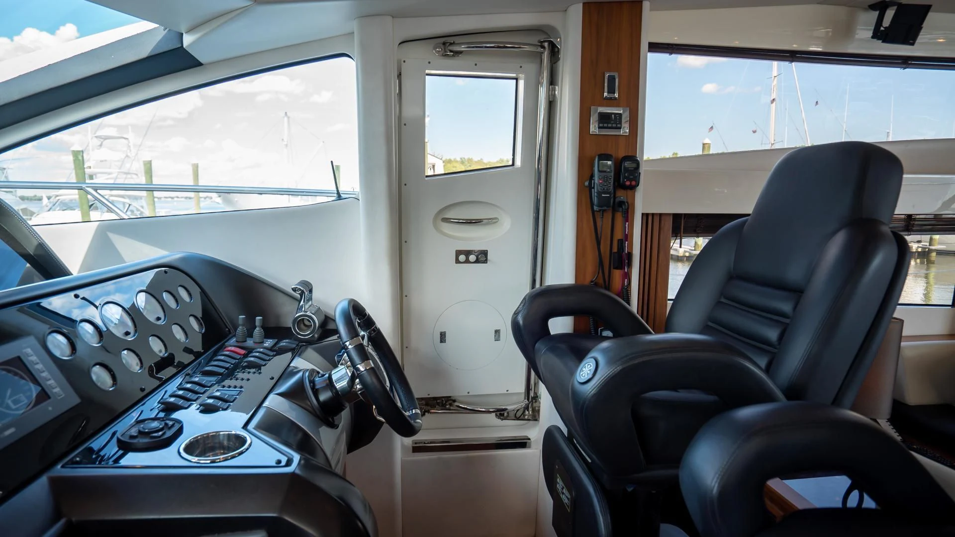 inside of a vehicle with a door open aboard JIMBO Yacht for Sale