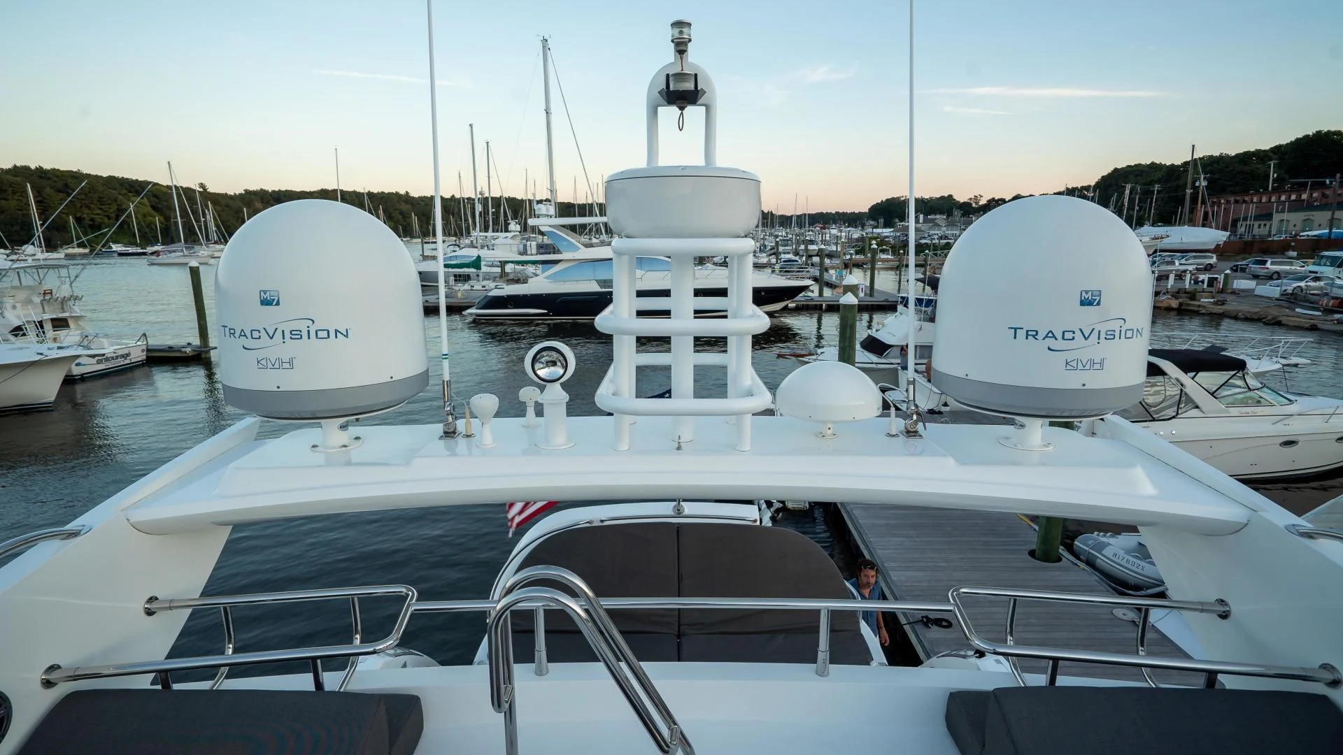a boat with many white sailboats aboard JIMBO Yacht for Sale