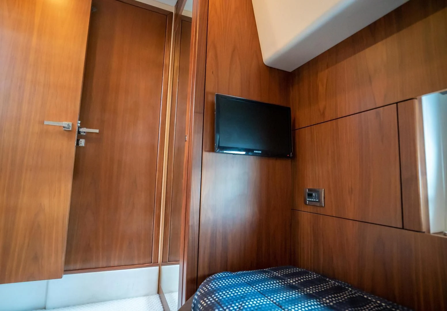 a bed in a room aboard JIMBO Yacht for Sale