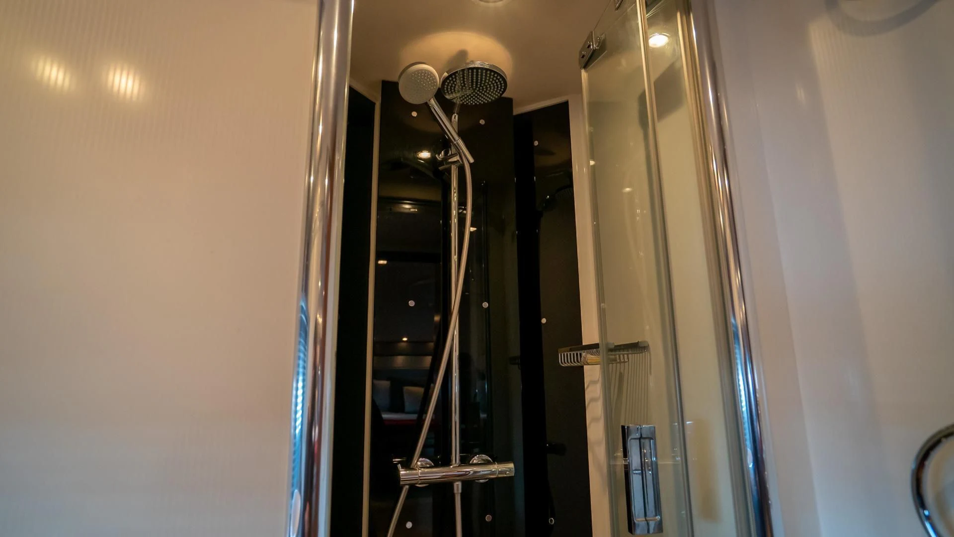 a row of black and silver lockers aboard JIMBO Yacht for Sale