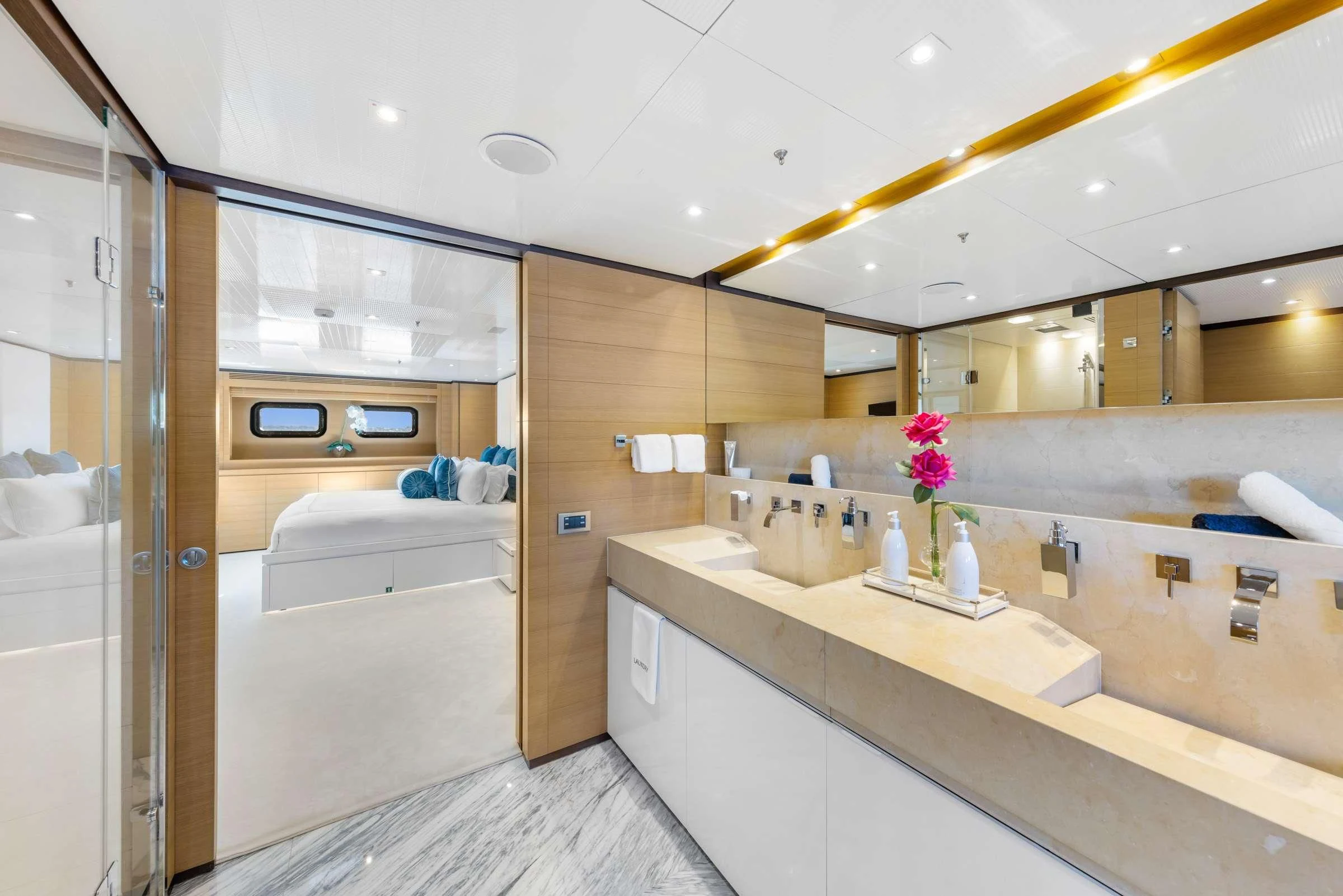 a bathroom with a countertop sink and cabinets aboard MISCHIEF Yacht for Sale