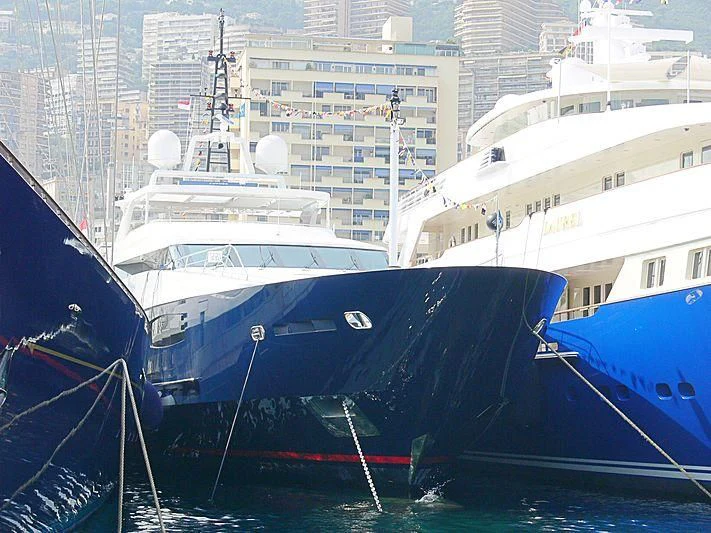 a group of boats are parked in a harbor aboard MISCHIEF Yacht for Sale