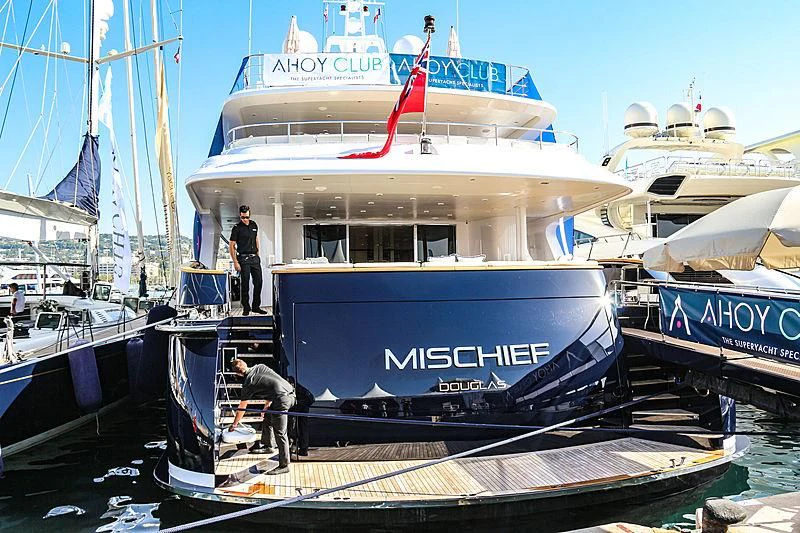 a boat docked at a pier aboard MISCHIEF Yacht for Sale