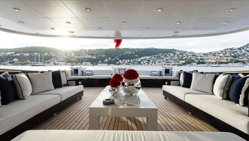 a living room with a white couch and a white couch aboard MISCHIEF Yacht for Sale