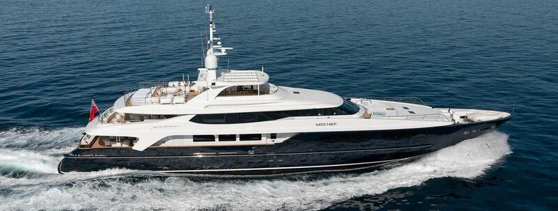 a white yacht on the water aboard MISCHIEF Yacht for Sale