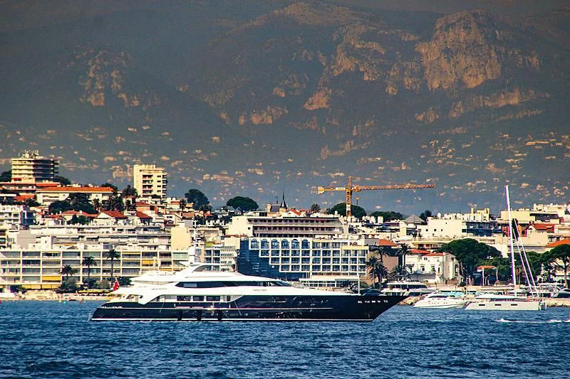 a large cruise ship in the water aboard MISCHIEF Yacht for Sale