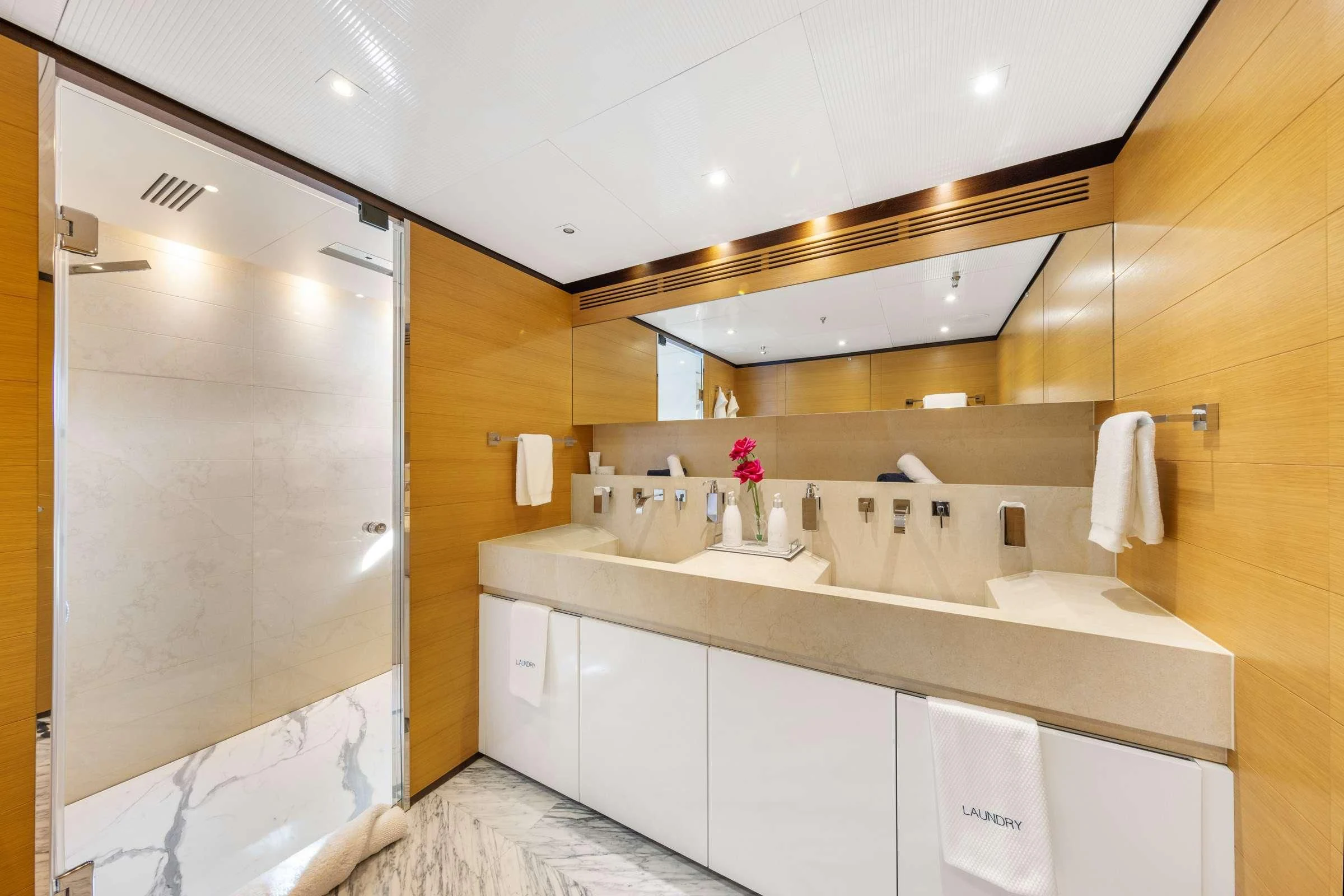 a bathroom with a large shower aboard MISCHIEF Yacht for Sale