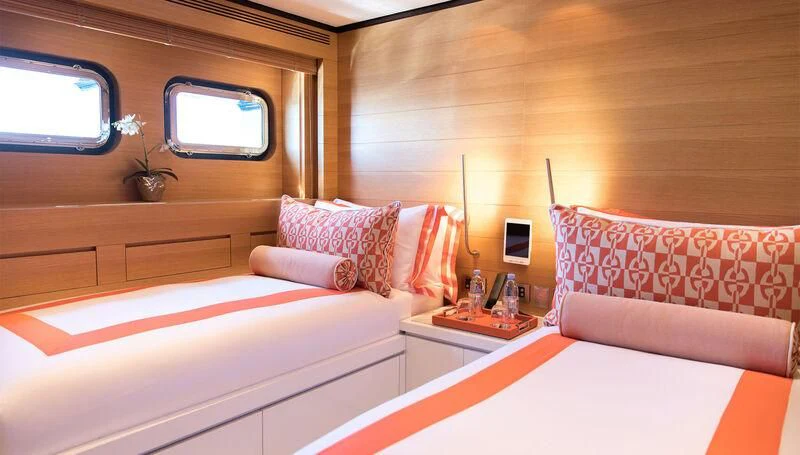 a room with two beds aboard MISCHIEF Yacht for Sale