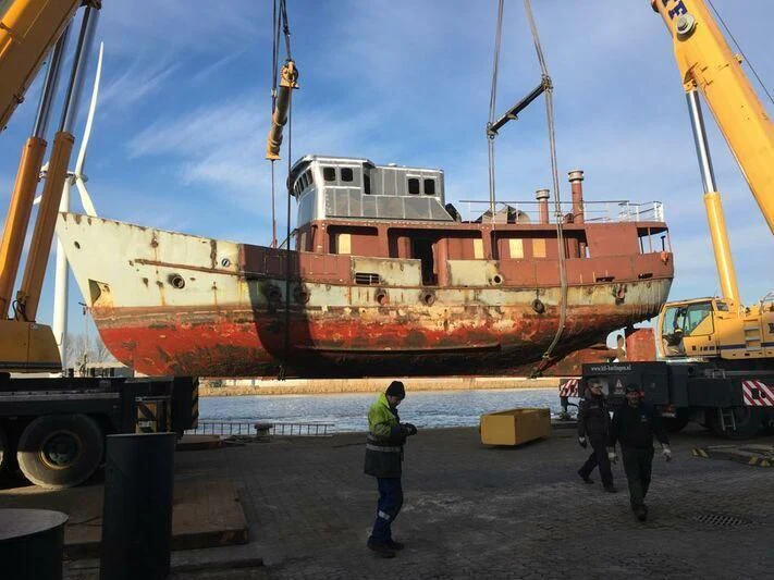 a large ship docked aboard SPIRIT OF GINETTE Yacht for Sale