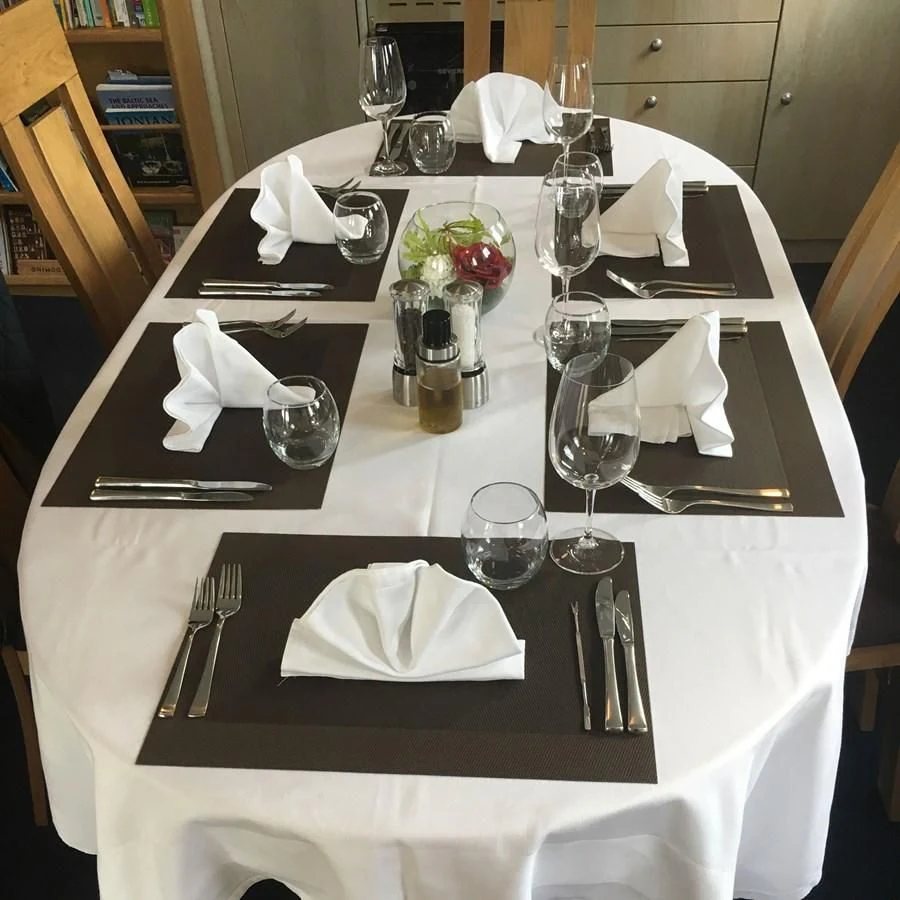 a table with place settings aboard SPIRIT OF GINETTE Yacht for Sale
