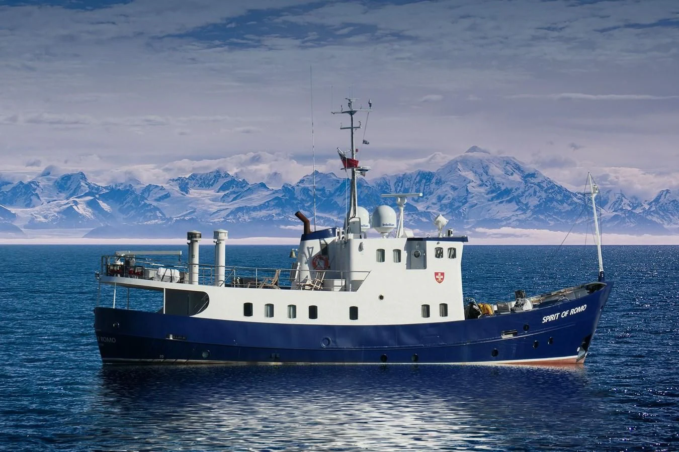 a large blue and white boat in the water aboard SPIRIT OF GINETTE Yacht for Sale