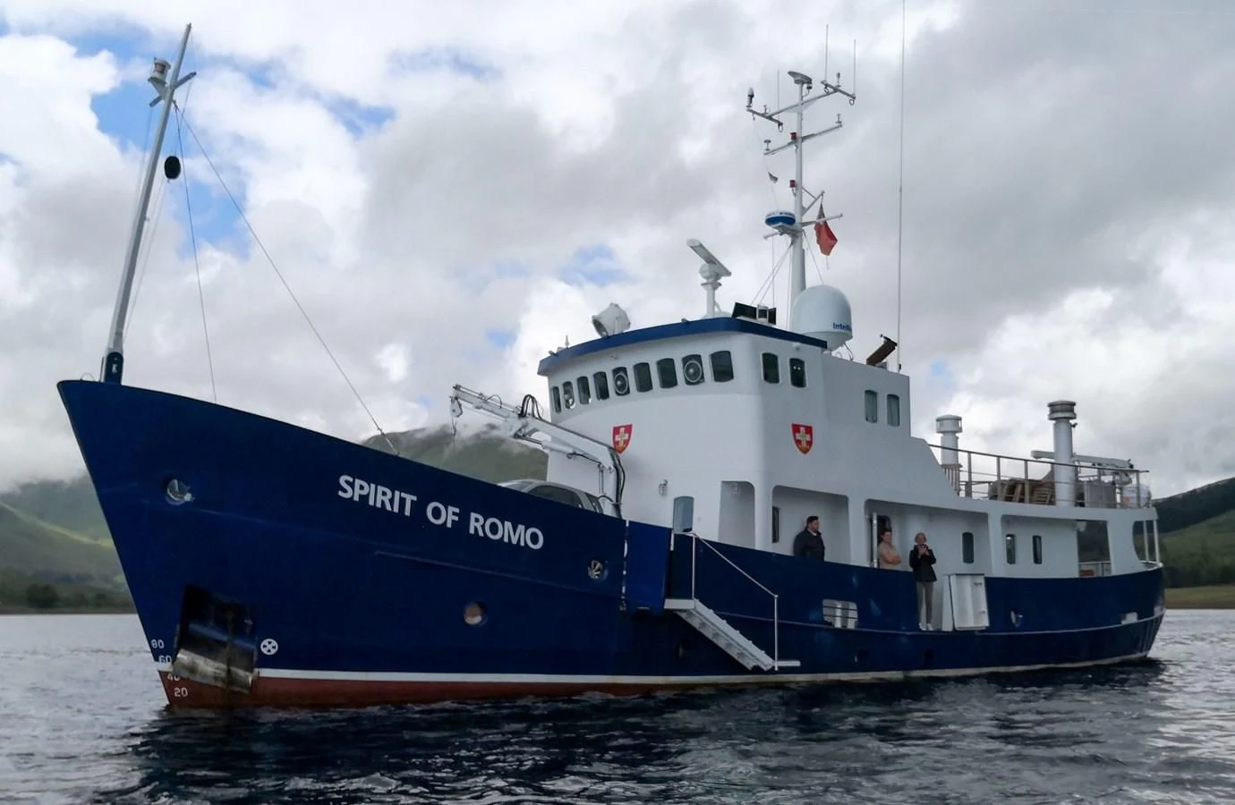a large blue and white boat aboard SPIRIT OF GINETTE Yacht for Sale