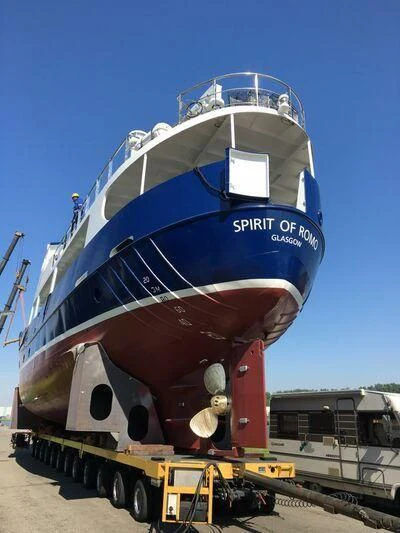 a large blue and red boat aboard SPIRIT OF GINETTE Yacht for Sale
